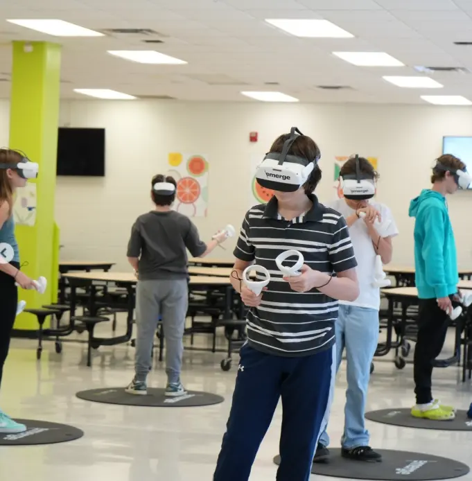 A classroom of students taking part in an immersive Emerge experience